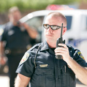Law enforcement officer with radio